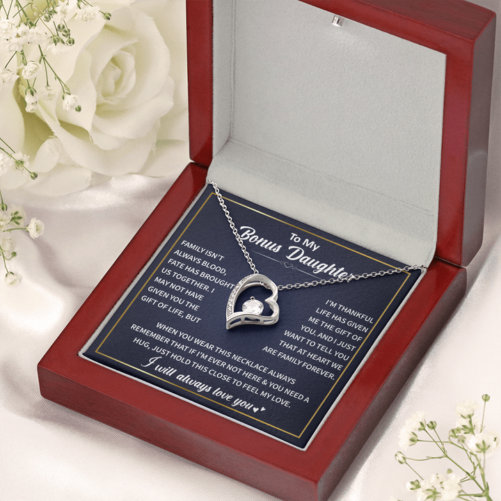 Heart-shaped pendant, clear stone.