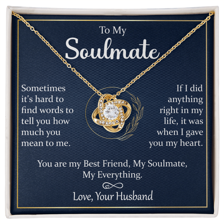 A gift box with a silver necklace and a heartfelt message.

