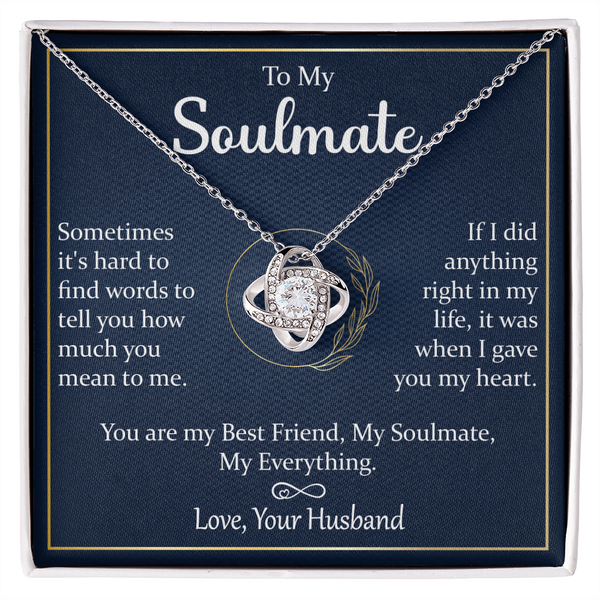 A gift box with a silver necklace and a heartfelt message.


