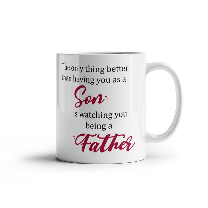 "White mug with ‘Son’ and ‘Father’ in red text"

