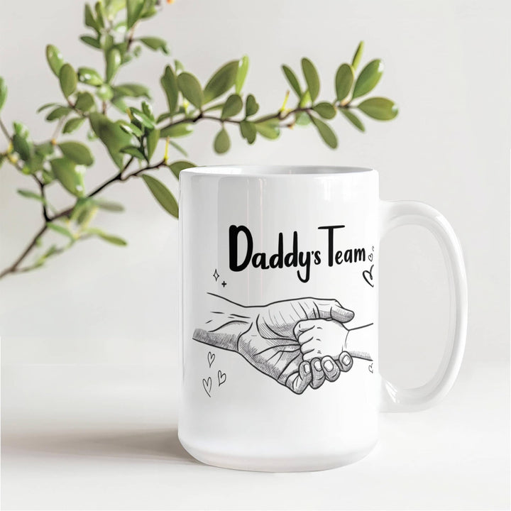 Father and baby hands on 'Daddy's Team' mug