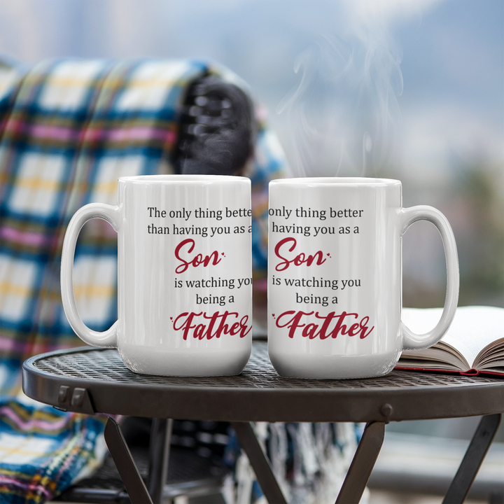 "White mug with ‘Son’ and ‘Father’ in red text"

