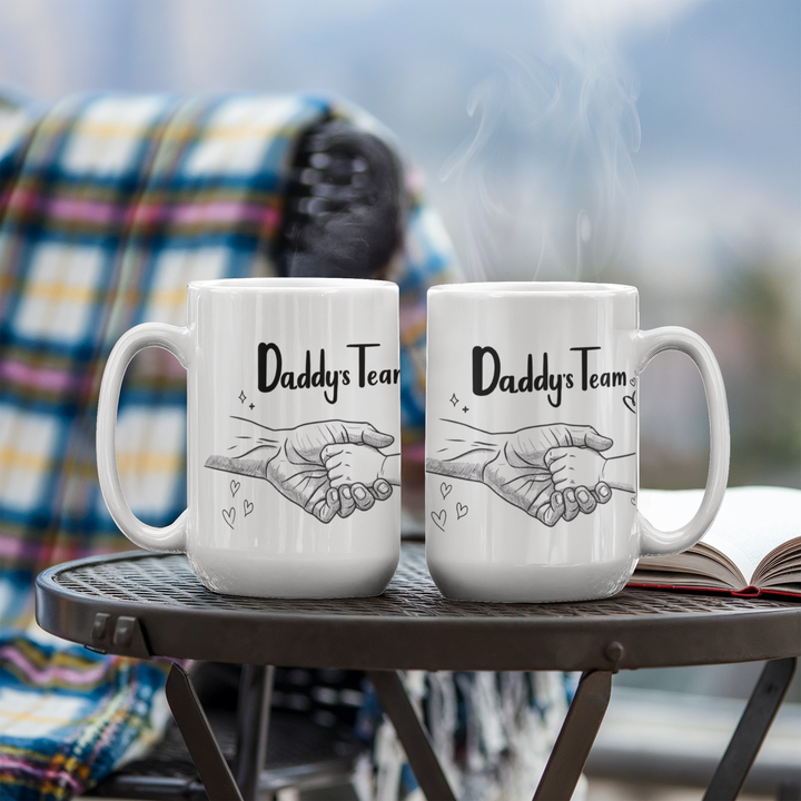 Daddy’s Team’ mug with touching hand design
